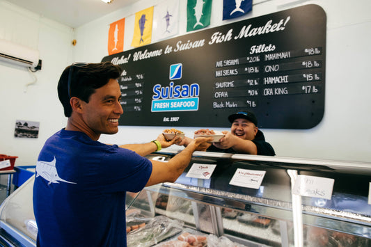 Robert Patterson of Hilo visits Suisan Hilo, the newest retailer of Sundot Marine Flags